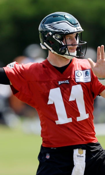 Wentz eager to return, but Foles allows Eagles to wait